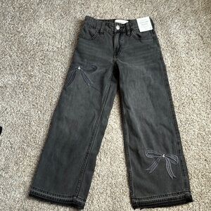 Stylish black Jeans with Bow Accents